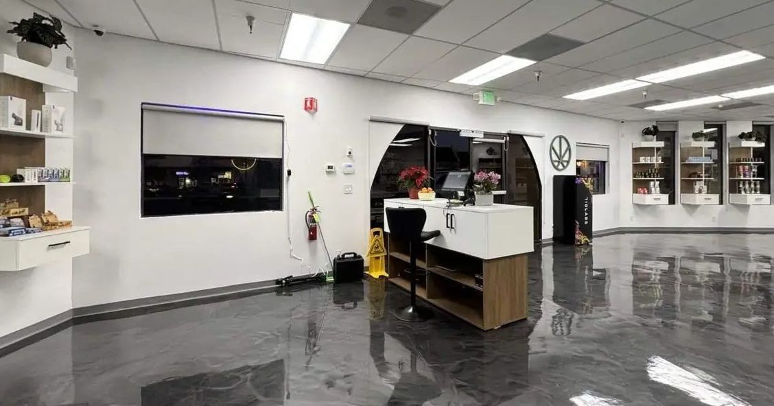 Cannavine dispensary interior with polished floor and product display shelves